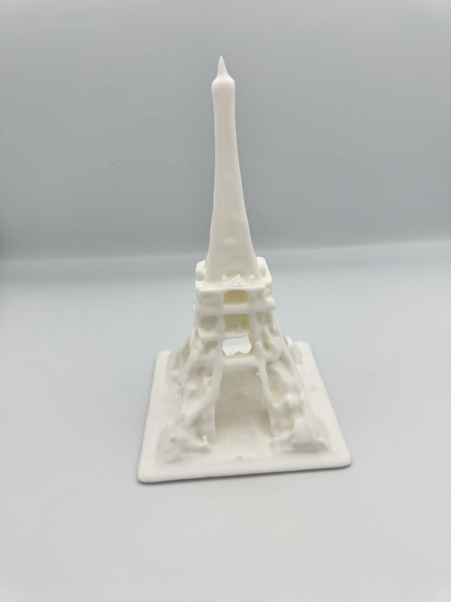 Eiffel Tower An image of a 3D-printed model of the Eiffel Tower in white.