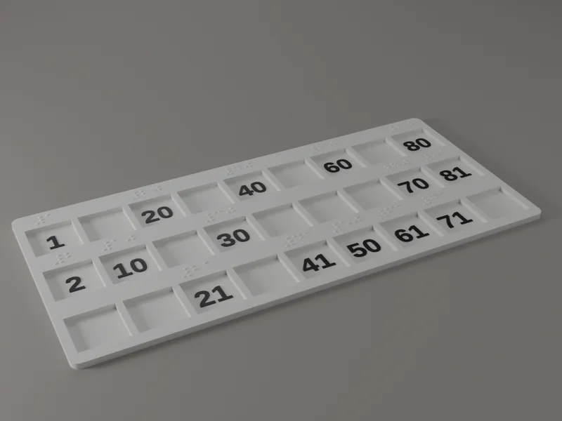 Render of a white banko plate at an angle: three rows of nine square fields, black numbers in the filled fields and raised braille dots on the border above each number.
